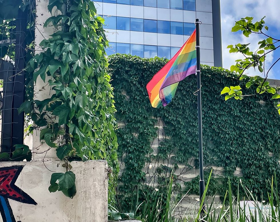 montevideo uruguay October 2022 rainbow or pride flag is hanging on a pole on the plaza de la diversidad next to the president office