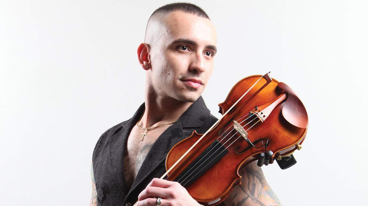 musician Marcos Aycox with his violin
