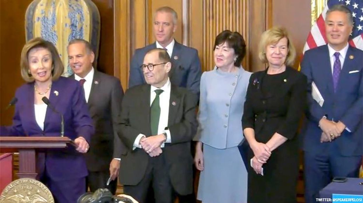 Nancy Pelosi and lawmakers