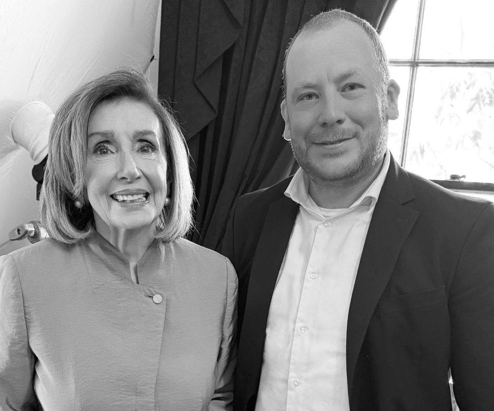 nancy pelosi and photographer mike nelson