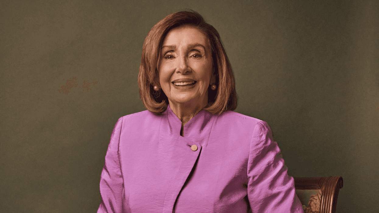 Nancy Pelosi in a pink blouse, photographed for The Advocate.