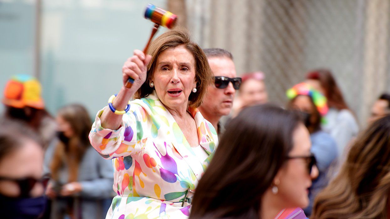 Nancy Pelosi raises a rainbow gavel during san francisco pride parade 2022