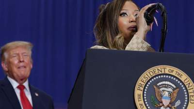 Singer Nicki Minaj speaks as President Donald Trump listens during a campaign rally at McMorran Place Sports & Entertainment Center on October 25, 2026, in Port Huron, Michigan