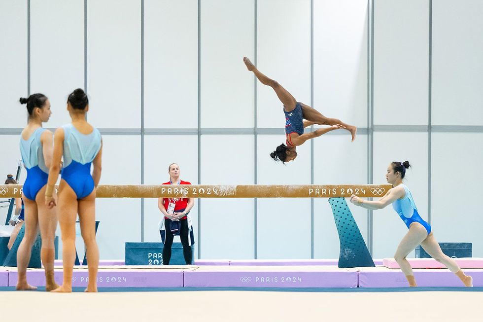 Olympic Gymnastics simone biles team USA balance beam practice female gymnasts watch Paris Games 2024