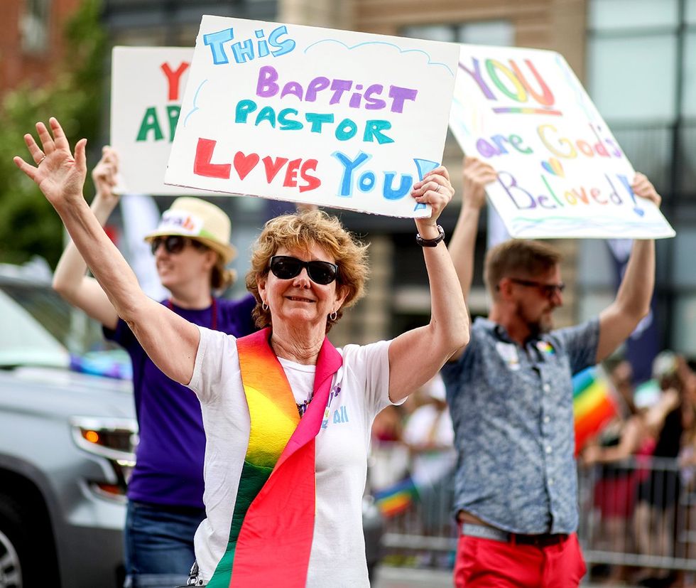 OPED Angela Yarber queer author Baptist pastor love sign Washington DC Capital Pride Parade LGBTQ support