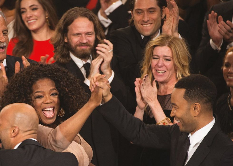 Out TCM host Dave Karger 50 Oscar winners big nights book Page 059 Oprah congratulating John Legend