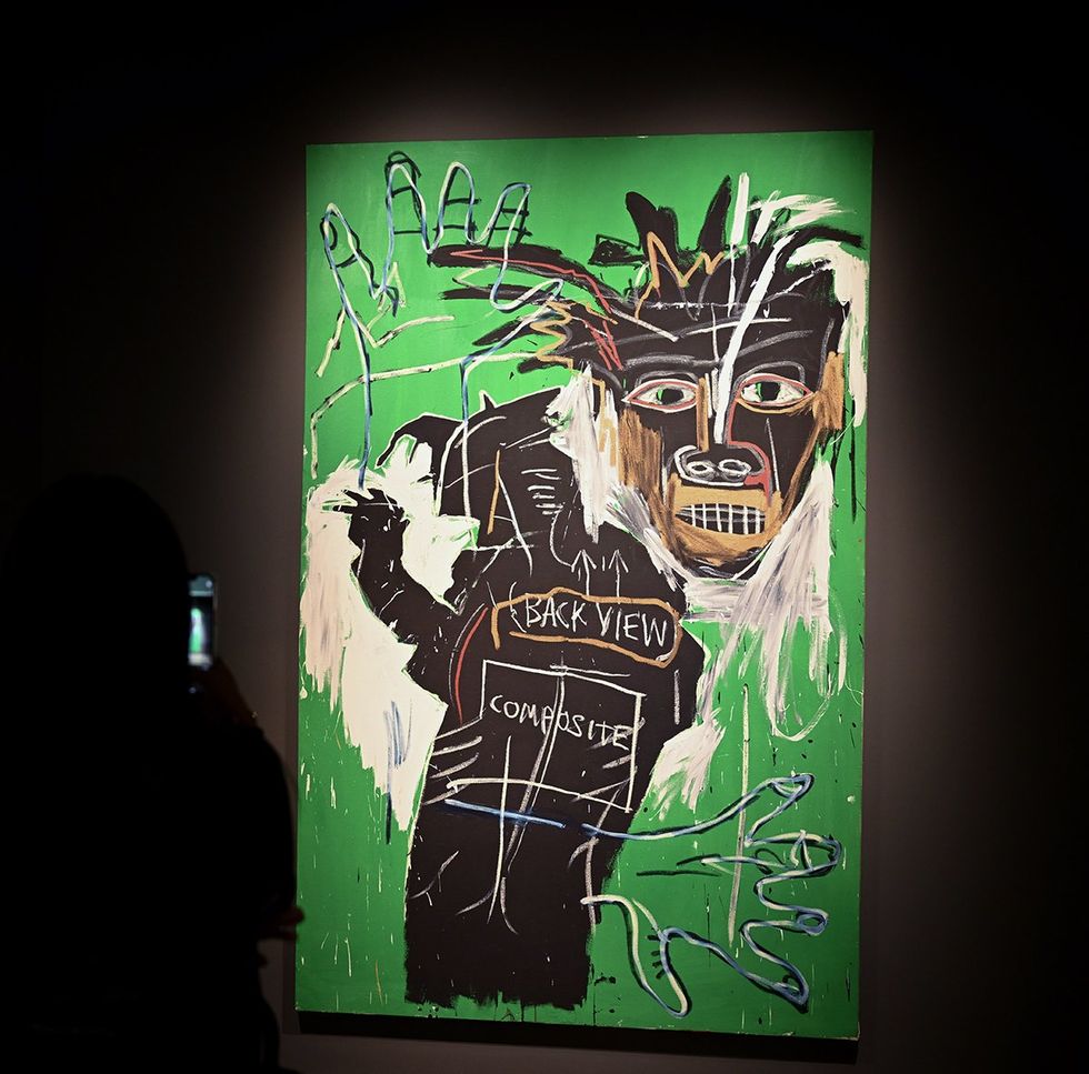 Painting by Jean Michel Basquiat named Self Portrait as a Heel Part Two 1982 on display at Sothebys Auction House in New York City