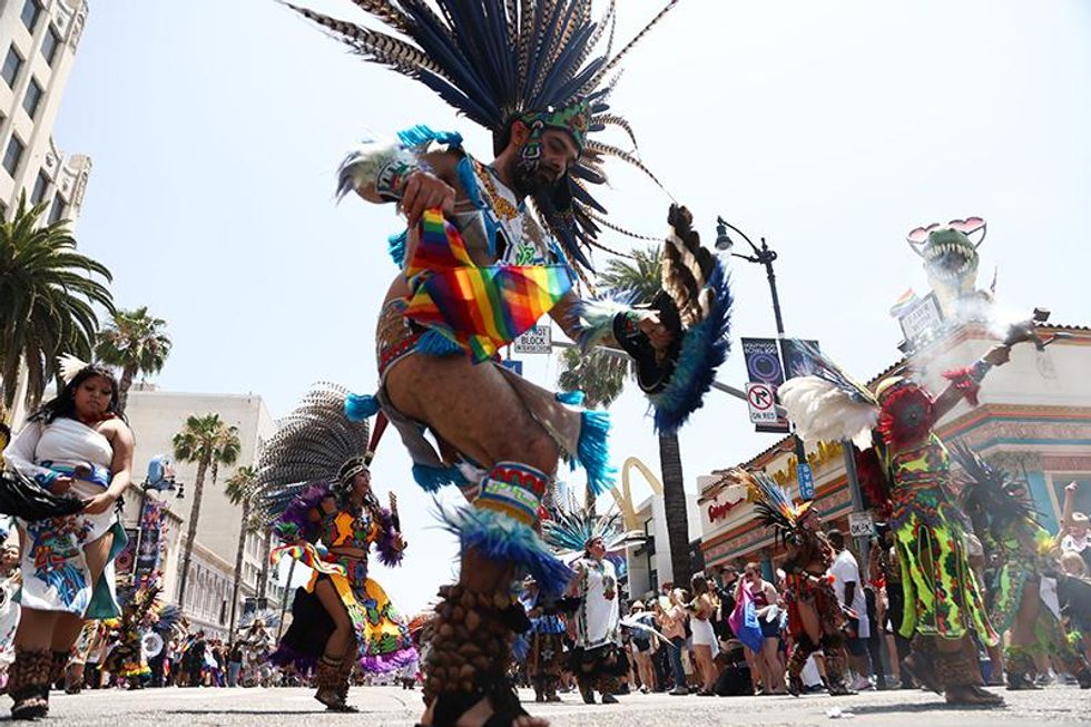 Parade participants attend Christopher Street West (CSW) LA Pride Parade on June 12, 2022