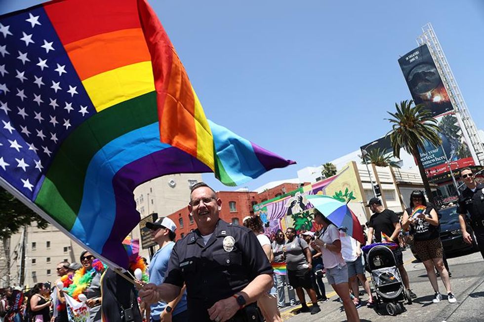 Parade participants attend Christopher Street West (CSW) LA Pride Parade on June 12, 2022