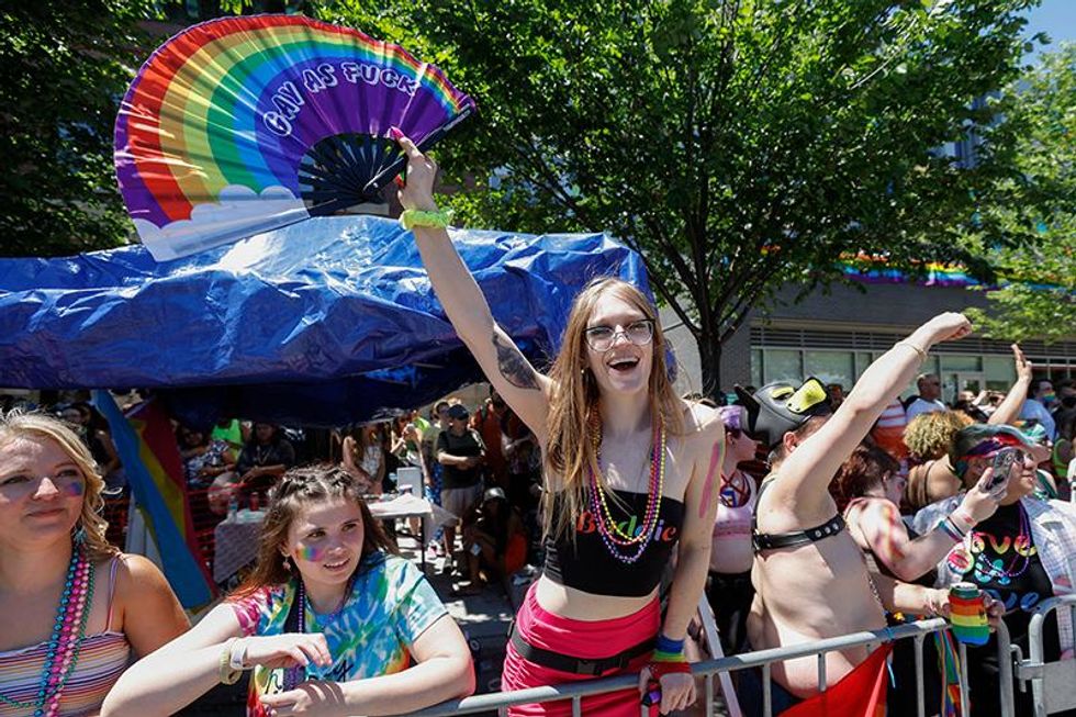 Parade watchers at the 51st LGBTQ Pride Parade in Chicago, Illinois, on June 26, 2022. The Pride Parade returned to the Lakeview and Uptown neighborhoods after a three year hiatus due to the coronavirus pandemic.