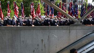 Hundreds of masked racist extremists march in D.C. as Trump’s Freedom 250 celebration unfolds