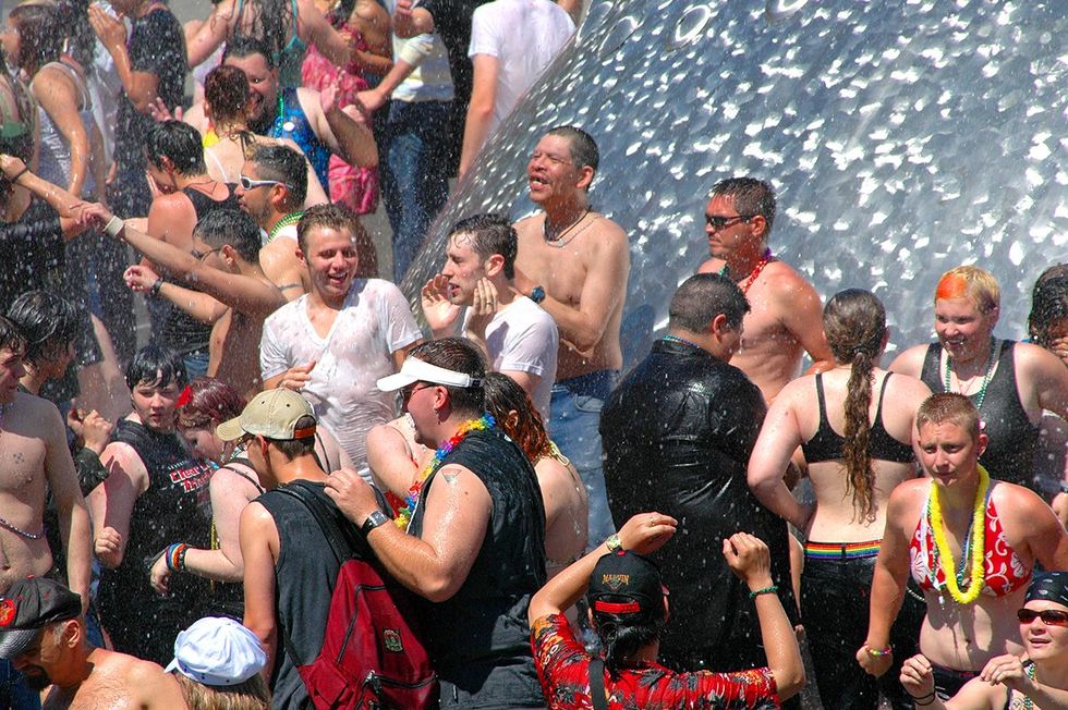 People dancing at the Seattle Center hosting LGBTQ Pride celebration