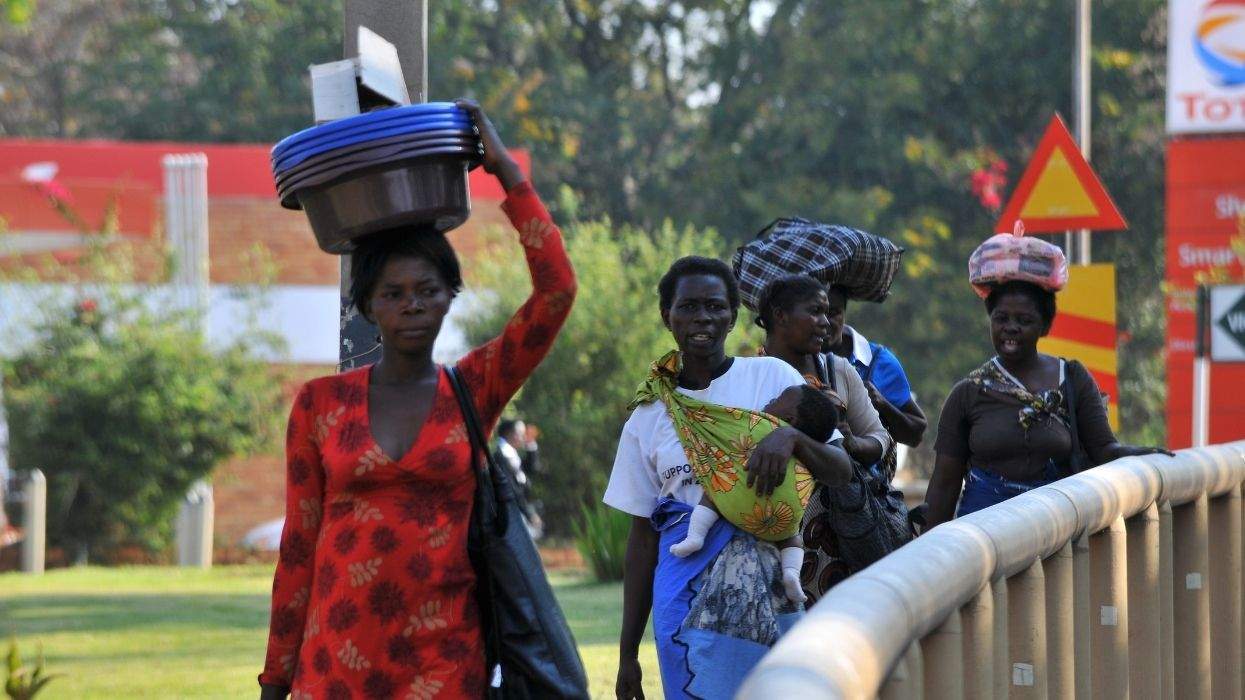 people going about their lives in botswana