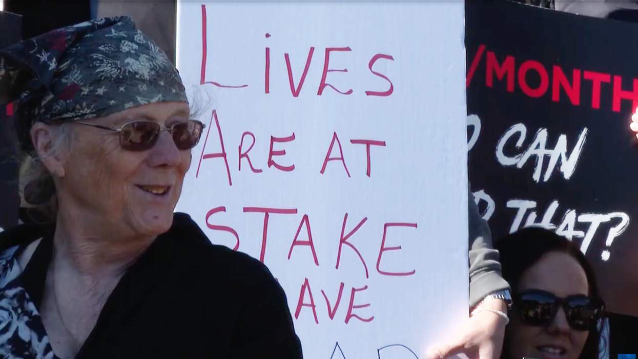 people protesting after Florida's decision to cut off thousands from receiving affordable HIV meds