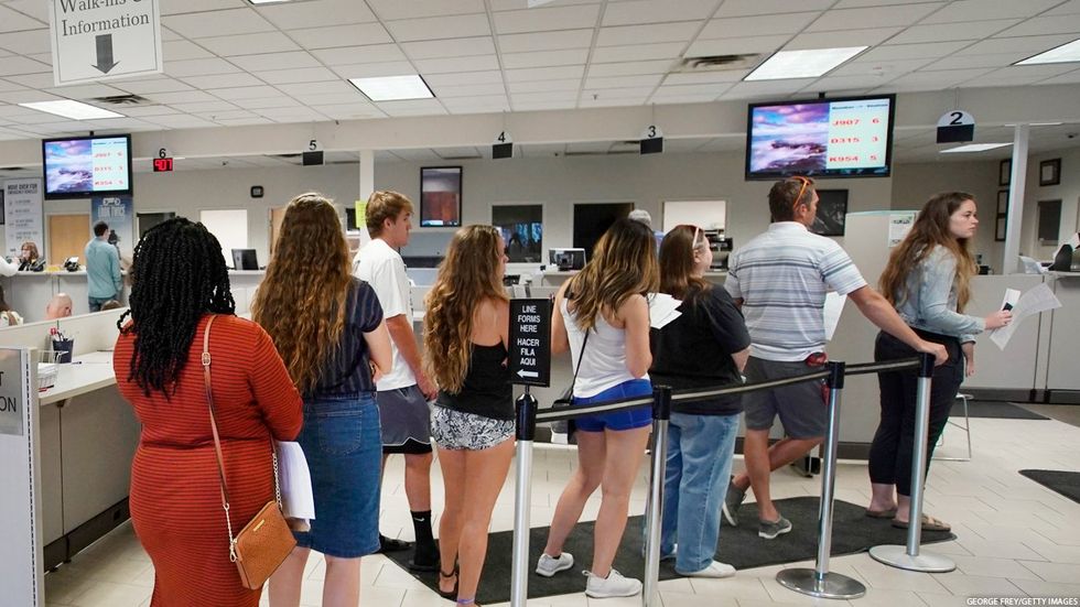 People standing in line at a government agency