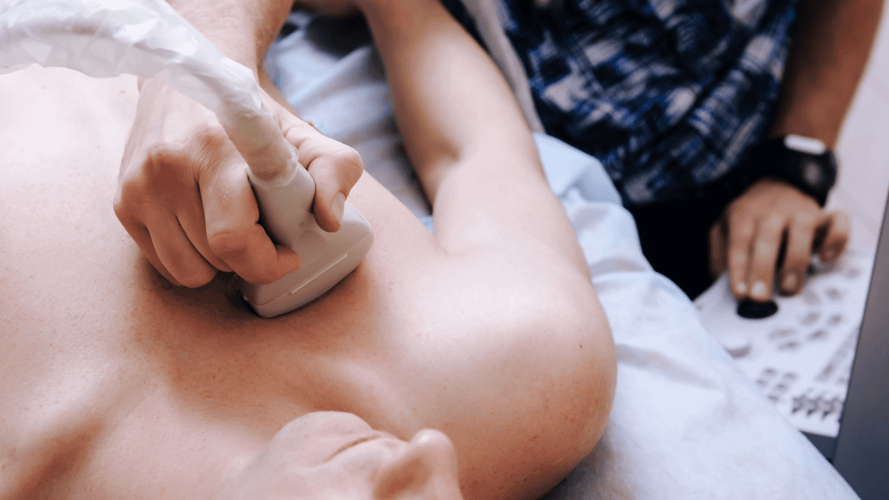 person getting chest scanned in heart ultrasound, representing transgender cardiovascular health