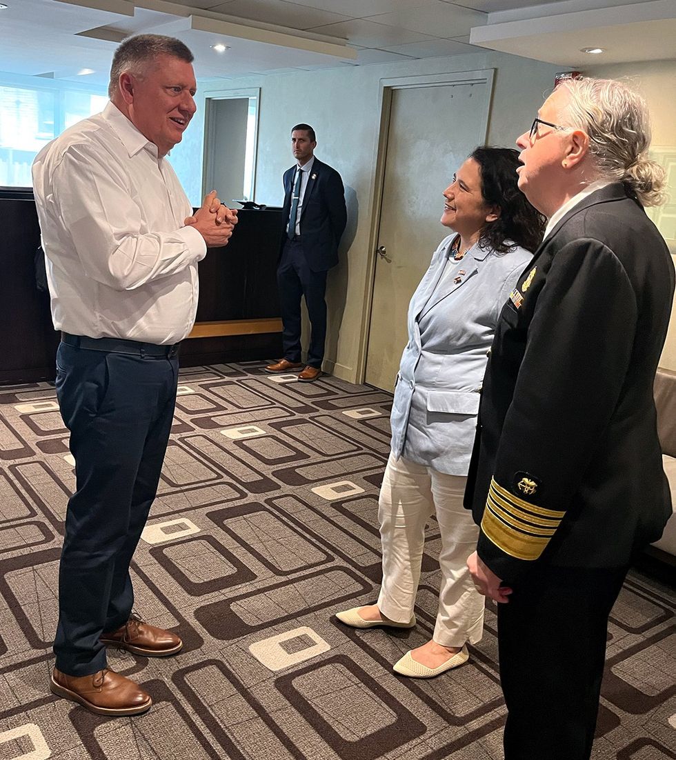 person greets Small Business Administration Isabel Guzman Health and Human Services Assistant Secretary Admiral Rachel Levine