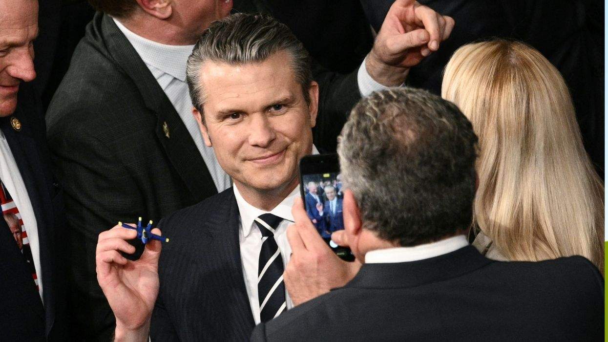 pete hegseth holding a toy plane