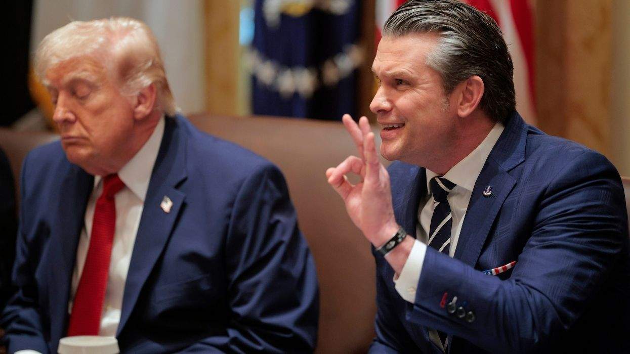 pete hegseth sitting next to donald trump who has his eyes closed