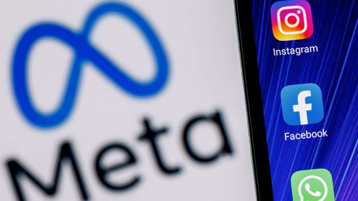 Phone screen with Meta sign and then icons with Instagram, Facebook, and WhatsApp icons as well