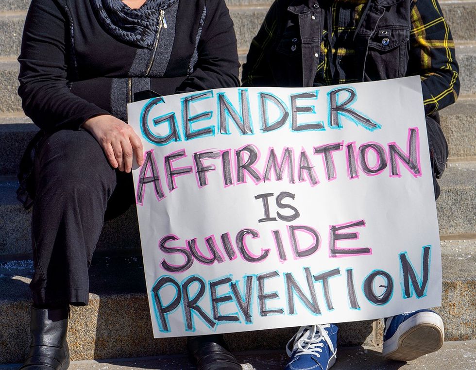 Photo Gallery LGBTQ bodily autonomy laws take effect starting 2024 IDAHO Boise protect transgender youth rally sign