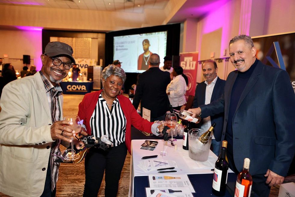 Photo Gallery of Easterseals South Florida's 33rd Annual Festival of Chefs - Guests with Alfredo Vega (left) and Daniel Borrego (right) from Alden Wines