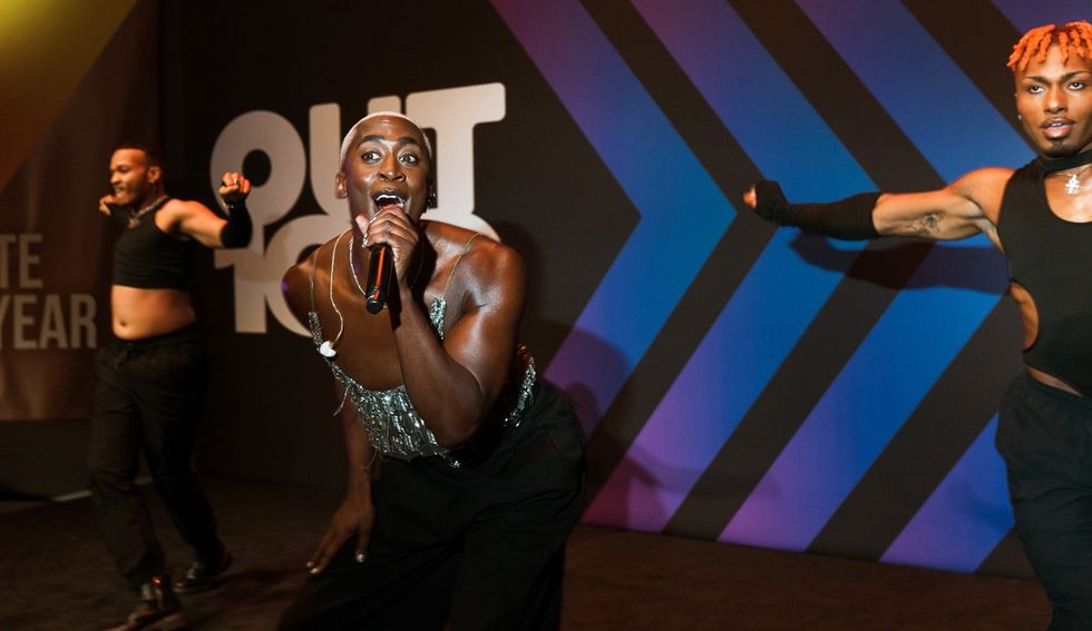 photo gallery queer photographer Roland Fitz Out100 2024 party pics vincint performing with dancers