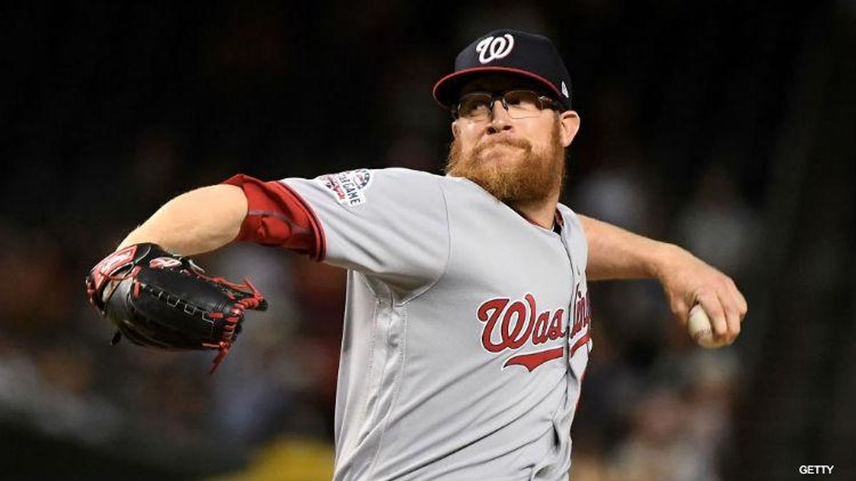 [Photo: Washington Nationals pitcher Sean Doolittle throws the ball at a game.]