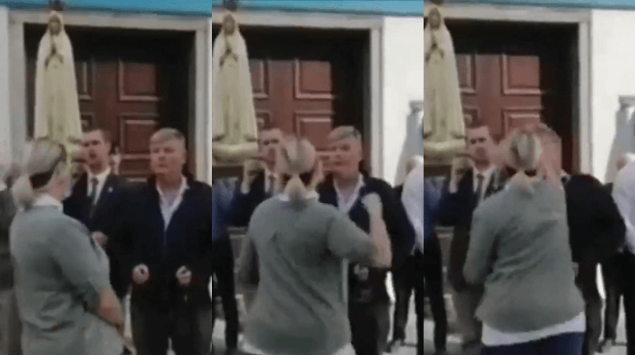 Picture of woman punching anti-LGBTQ+ protester