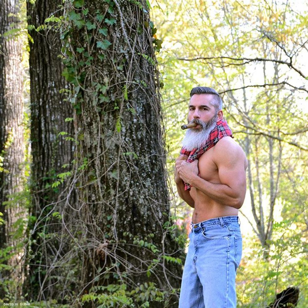 Pictured above: Cigar aficionado and photographer David M. Dudar enjoys his smoke. Read more below.