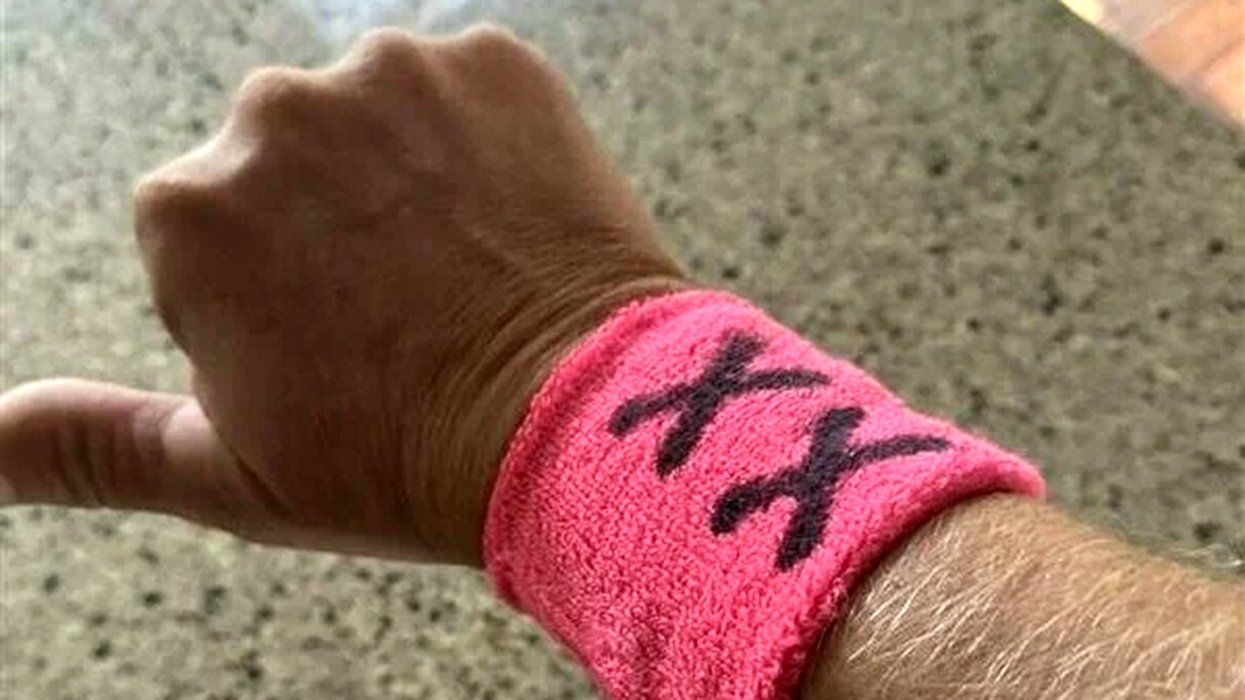 pink XX wristband new hampshire dads banned wearing to school sports events