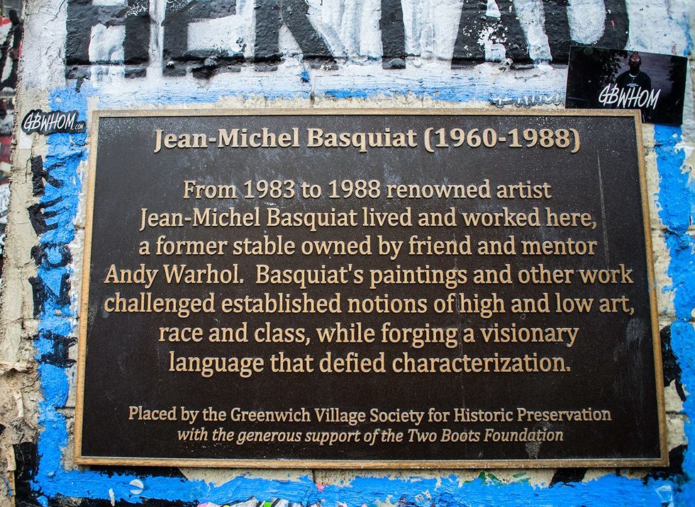 Plaque at former studio location of artist Jean Michel Basquiat located at 87 Great Jones Street in New York City it was previously a horse stable owned by Andy Warhol