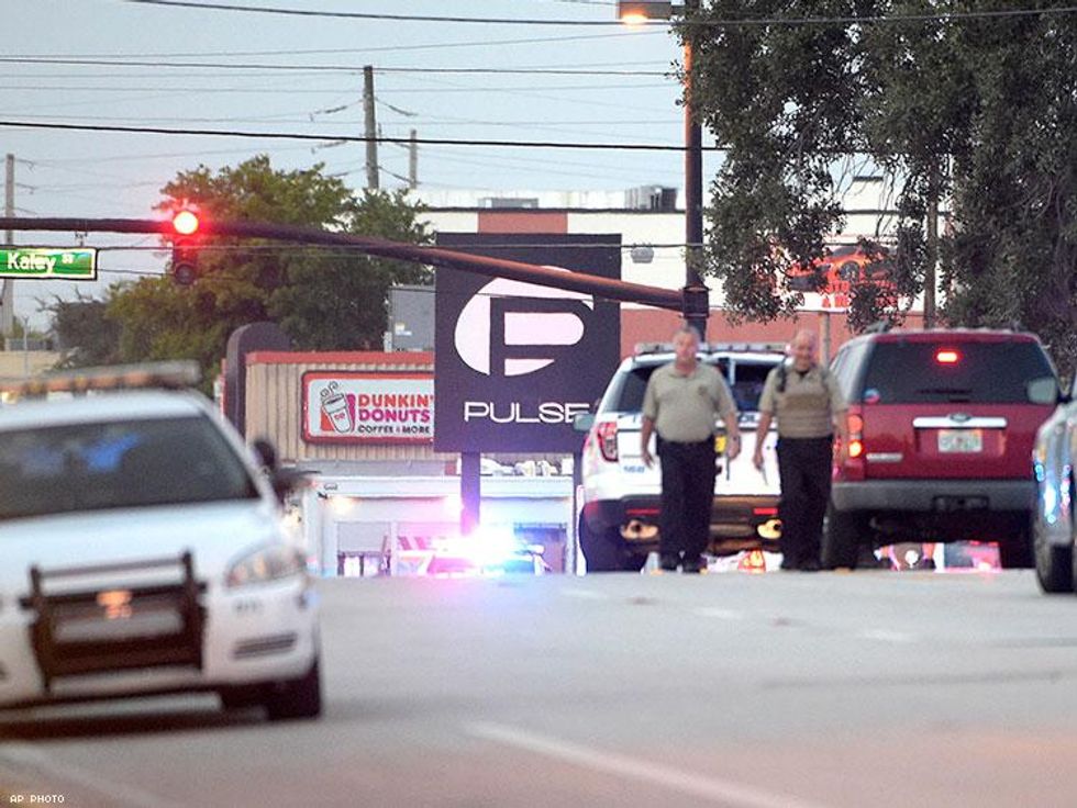 Police cars surround the Pulse Orlando nightclub.