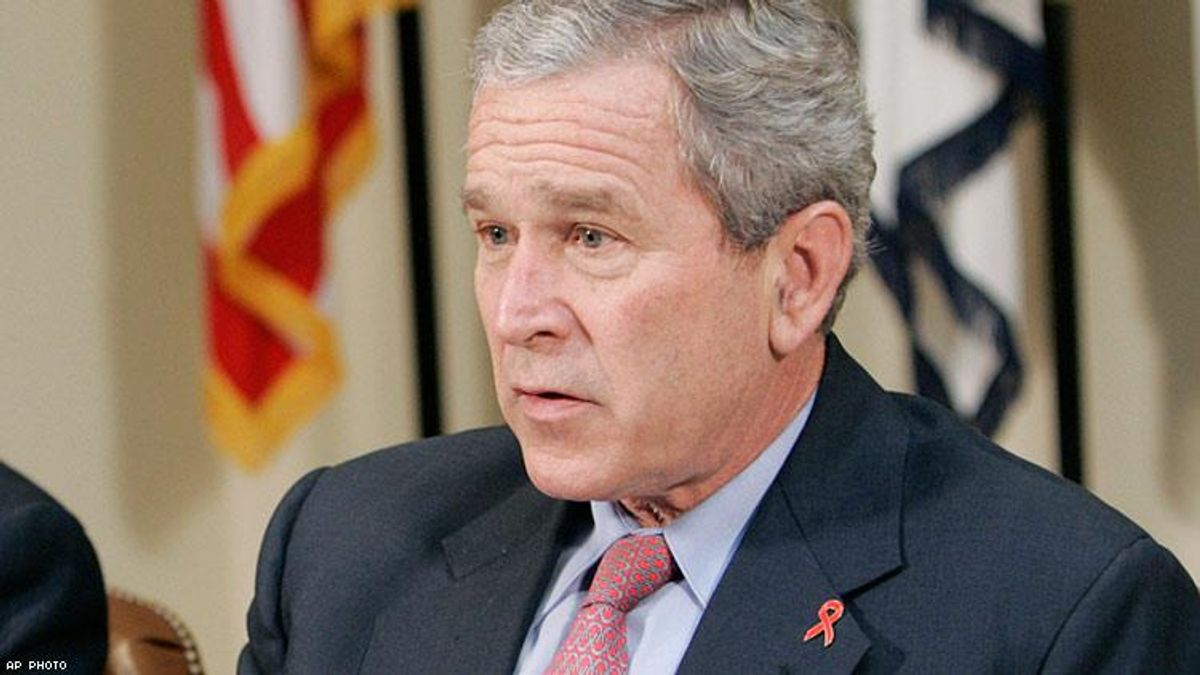 President Bush wearing his HIV/AIDS awareness pin on World AIDS Day in 2006.
