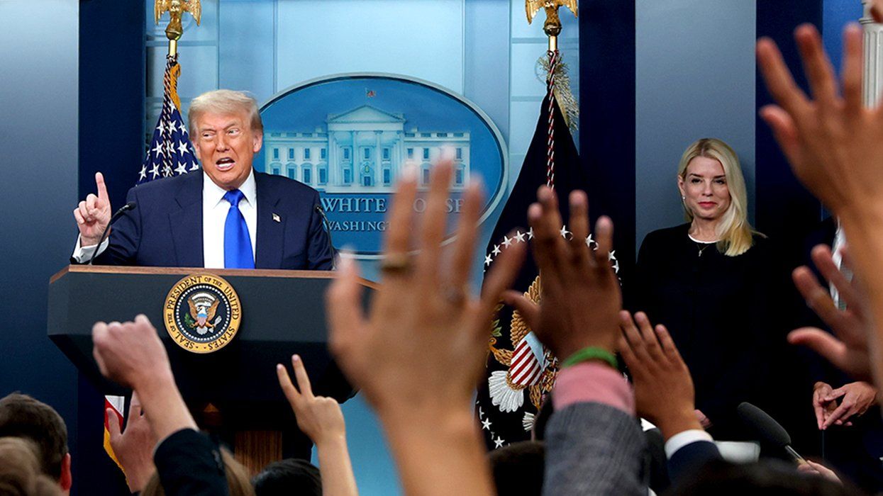 President Donald Trump joined by Attorney General Pam Bondi takes questions during a press conference
