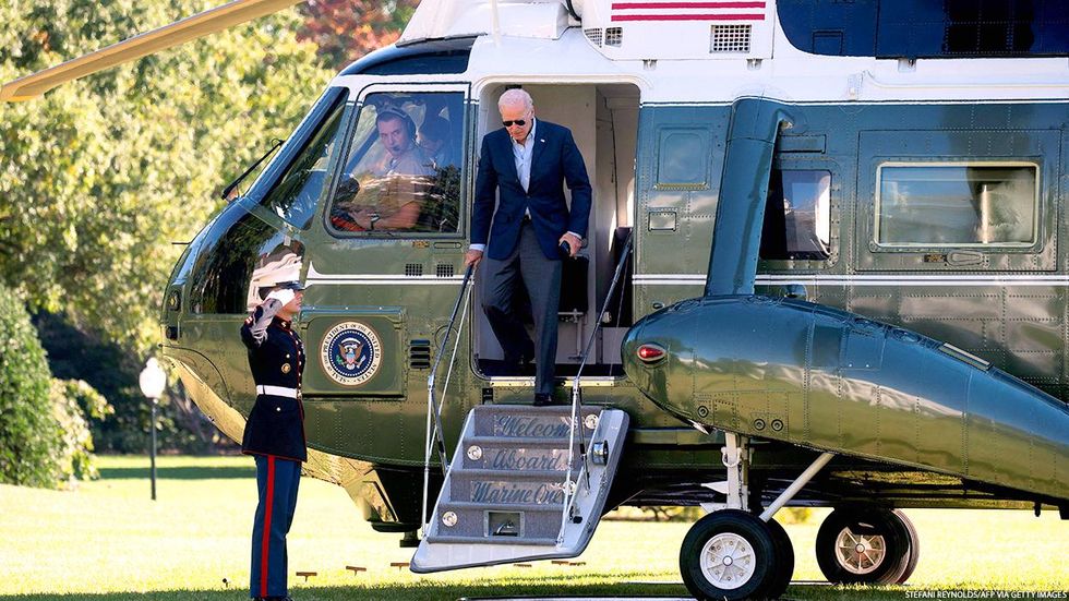 President Joe Biden coming off a helicopter 