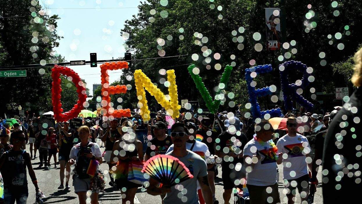 pride parade in denver with denver in colorful balloons