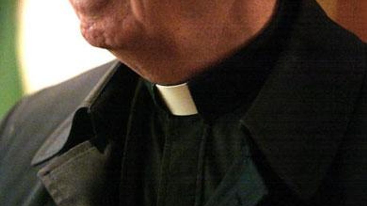 Priest-x390-%28getty%29-_-advocate