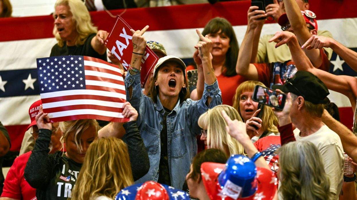 protester at a trump midterm rally in ohio