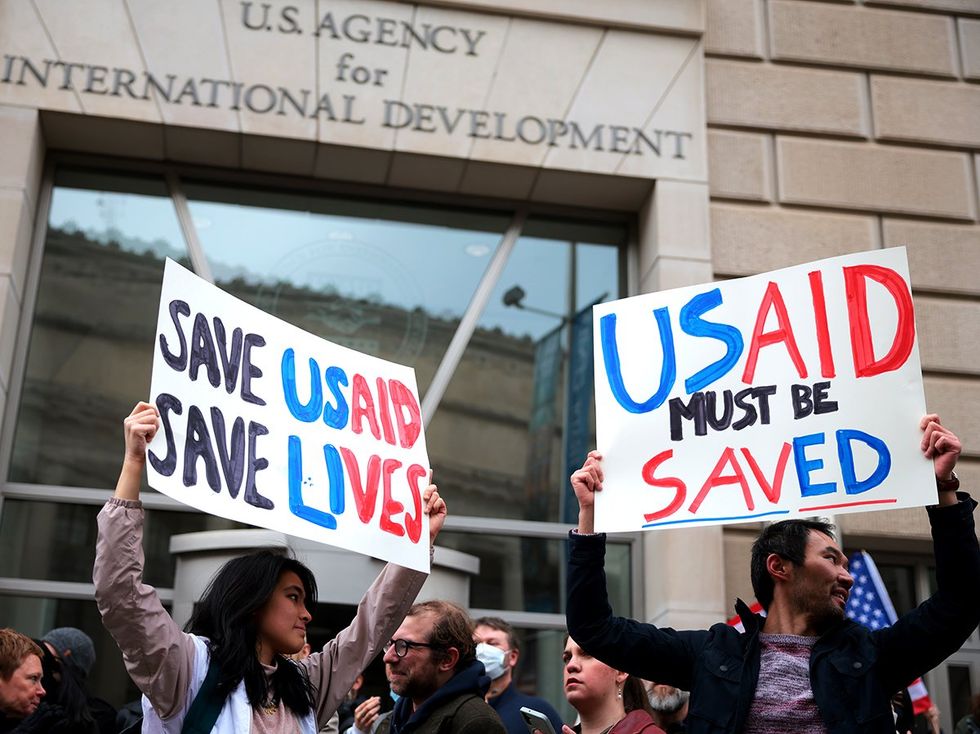 Protesters gather outside of USAID headquarters