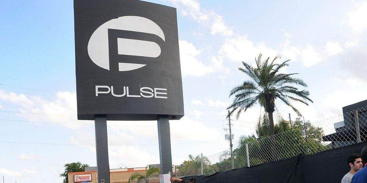 Orlando tears down 'horrific' Pulse sign. Survivor Brandon Wolf says it once meant safety
