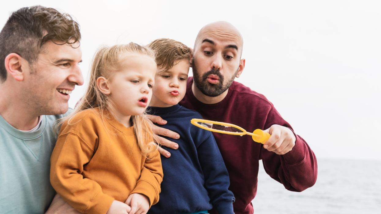 Queer family playing together