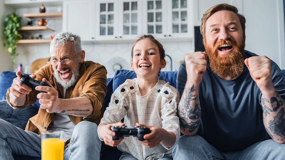 Queer Family Playing Video Games LGBTQ gay couple