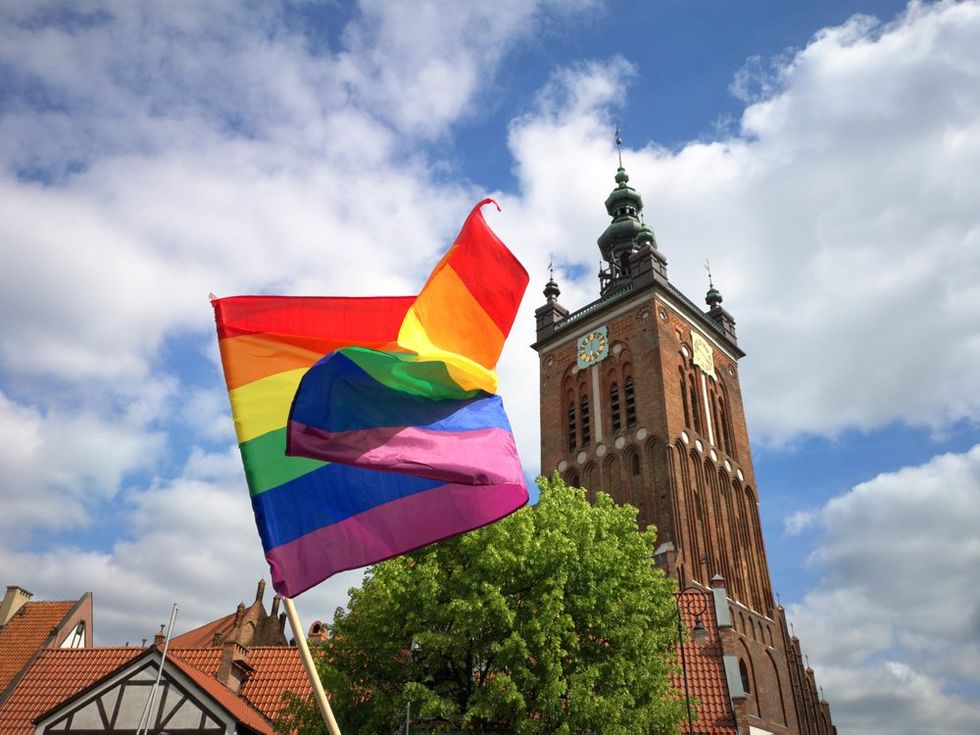 Raibow flag Catholic church Poland