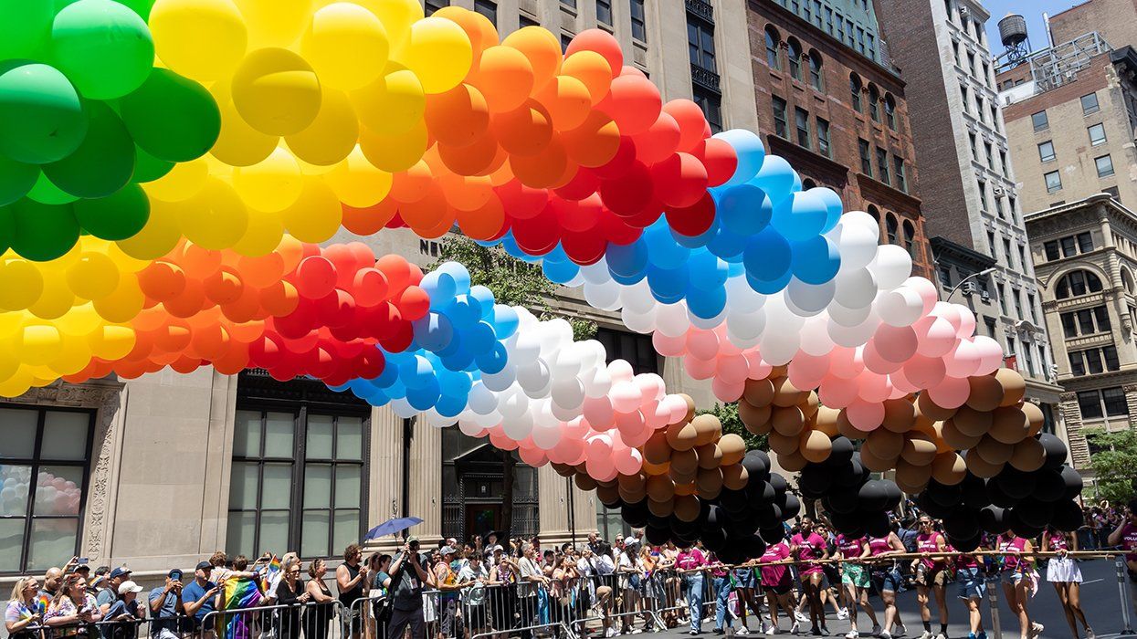 rainbow balloon arch in pride flag colors NYC LGBTQIA pride march 2023
