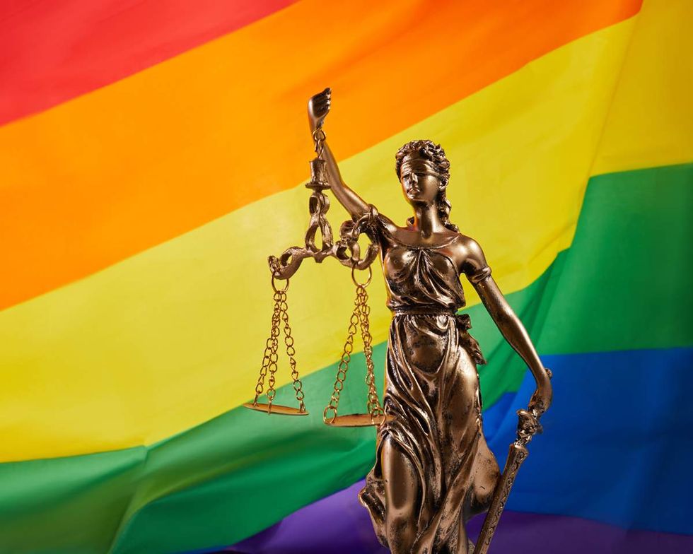 rainbow flag and scales of justice