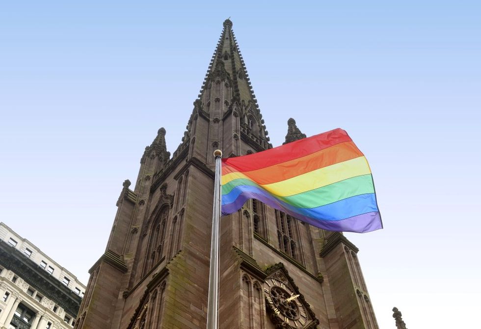 Rainbow flag in front of church