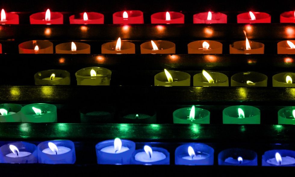Rainbow prayer candles