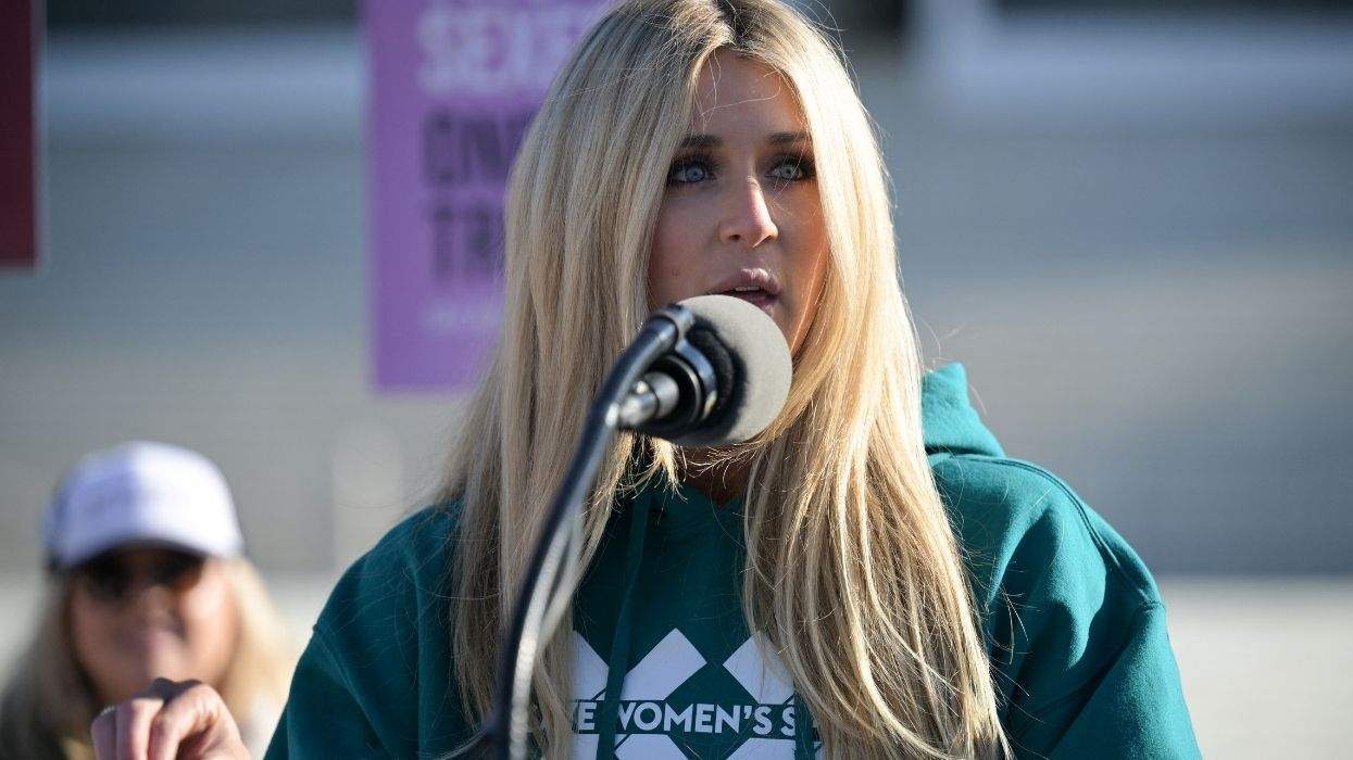 riley gaines speaks at scotus