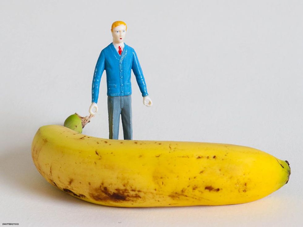 ripe banana and business man figurine